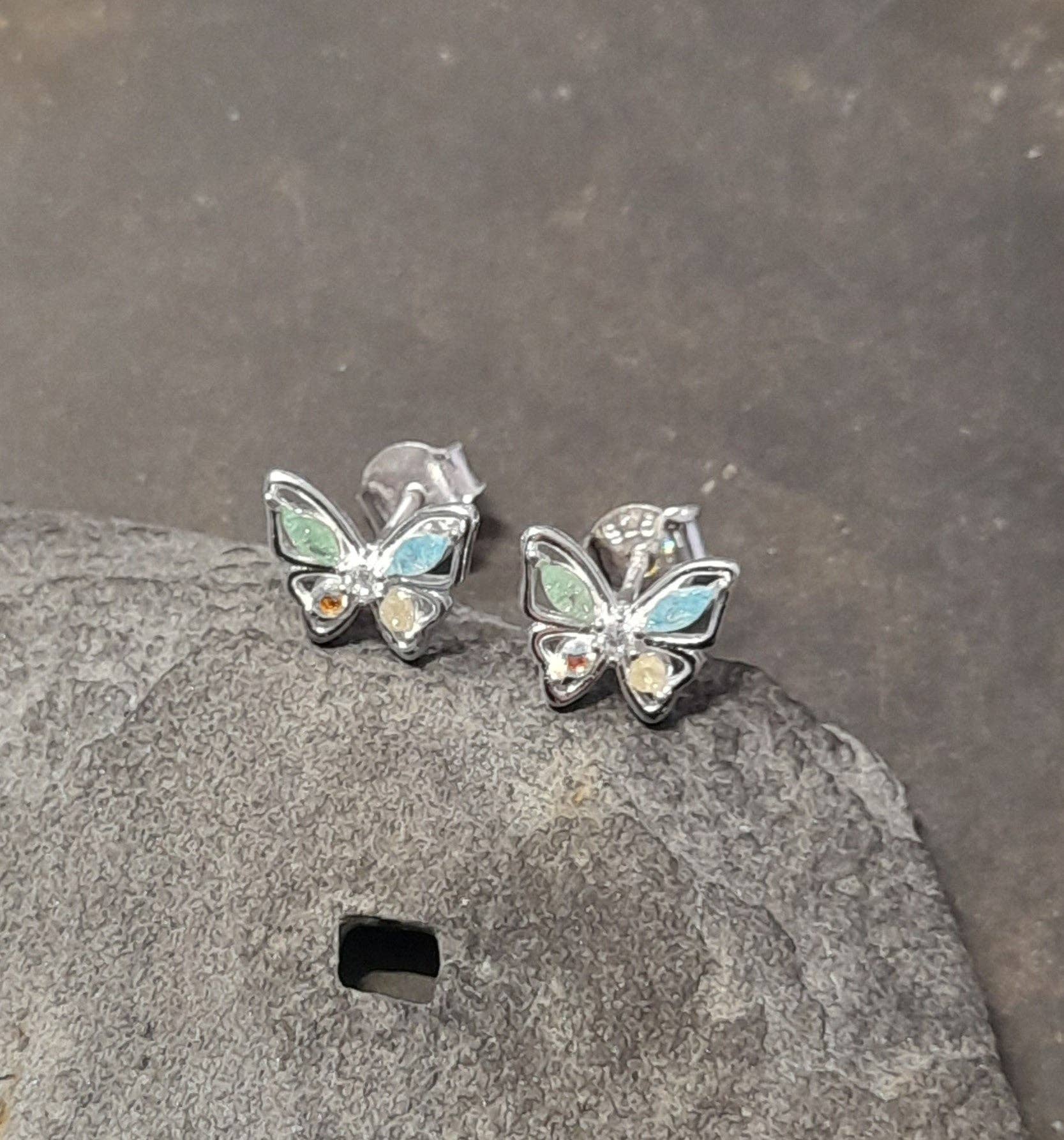 SS646B - PASTEL MULTI CZ B/FLY 9 X 7MM
