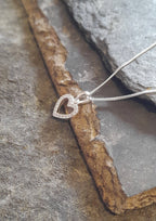 CZ OUTLINE HEART 10MM