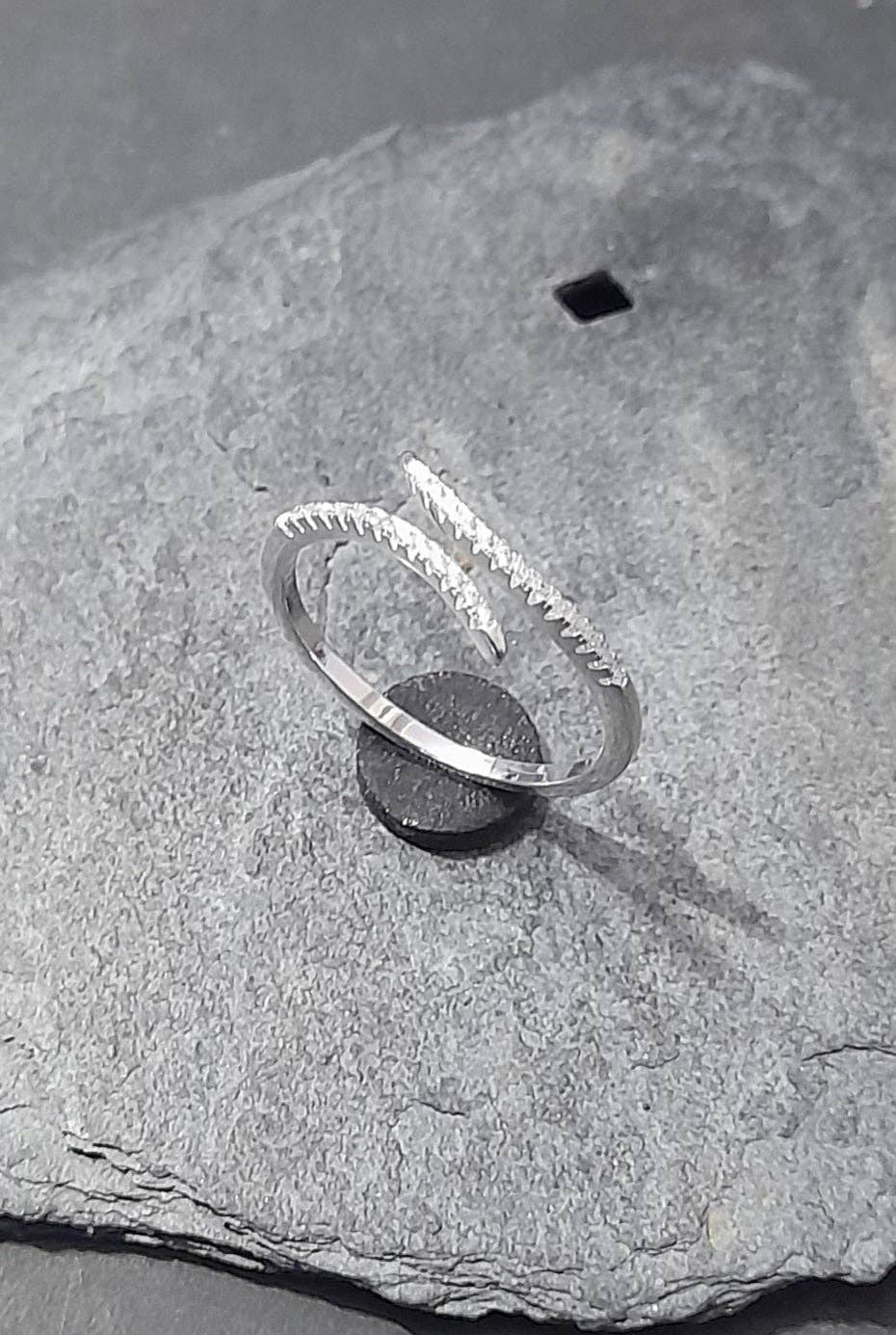 LOVE TWIST CZ RING ONE SIZE